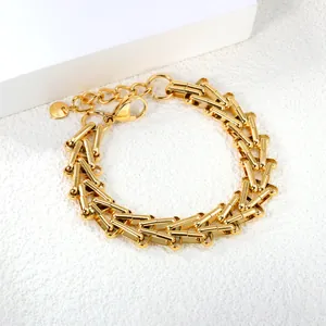 Minimalist gold stainless steel cylinder link bracelet with lobster clasp and tag