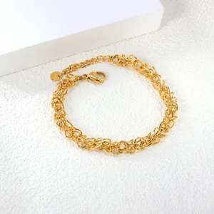 Polished gold stainless steel chain bracelet with geometric interlocking links and clasp