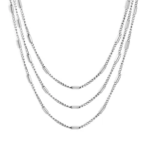 Polished silver stainless steel multi-layer necklace with cylindrical beads in a layered style