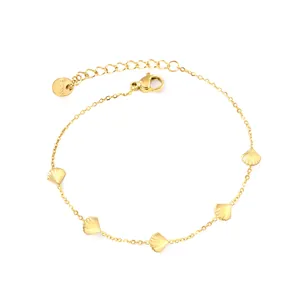 Minimalist 18k gold plated stainless steel bracelet with five polished scallop shell charms