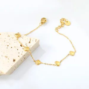 Minimalist 18k gold plated stainless steel bracelet with five delicate seashell pendants