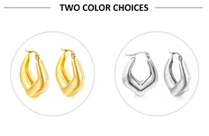 Detail view of U-shaped twisted earrings in 18k gold and silver polished finishes