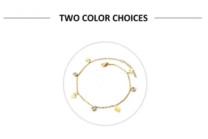 Detailed close-up of 18K gold stainless steel anklet with cactus charm and crystal