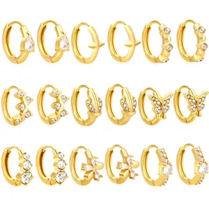 9-pair 18K gold plated huggie earrings set with geometric zircon inlays on white background