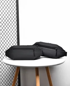 Detail of two black waterproof tactical leg bags with simple design and large capacity