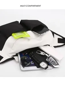 Internal view of crossbody bag showing multi-compartment storage for tablet and wallet