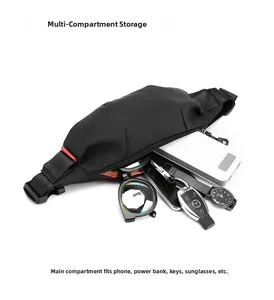 Internal view of black nylon waist bag showing organized EDC storage with orange lining