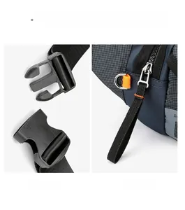 Detail of durable plastic buckle and smooth metal zipper on waterproof crossbody bag