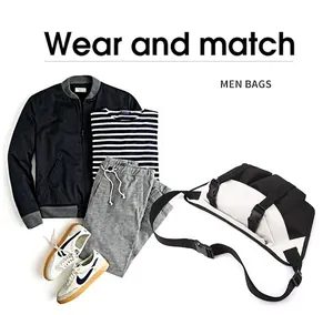 Flat lay of black and white crossbody bag with casual outfit and multi-compartment design
