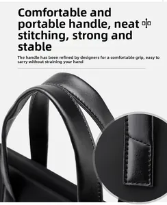 Close-up of black business briefcase handle with reinforced stitching and fine texture