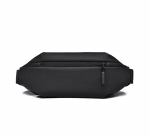Front view of a minimalist black tactical leg bag with waterproof zipper and matte finish