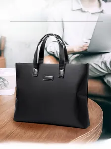 Business casual black tote bag with matte waterproof fabric and large capacity