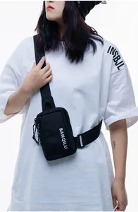 Close-up of black nylon crossbody phone bag with BANQILU logo and adjustable strap