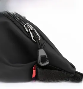 Close-up of durable waterproof nylon fabric and ergonomic zipper detail on chest bag