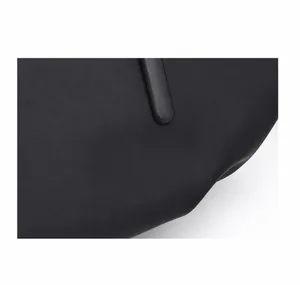 Macro detail of matte black tactical leg bag showing smooth edge finish and premium texture