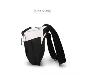 Side view of black and white color-block nylon crossbody bag with adjustable buckle strap