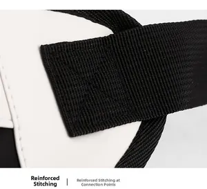 Macro view of reinforced X-shaped stitching on black nylon strap for durability
