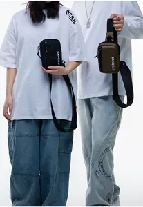 Nylon crossbody phone bags in black and olive green featuring adjustable shoulder straps