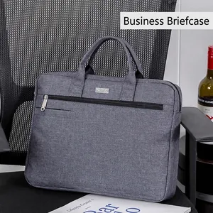 Grey waterproof business briefcase for laptops on office chair with professional style