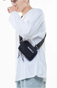 Men's casual black nylon crossbody phone bag with BANQILU white text on white background