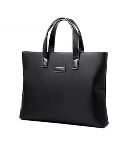 Side view of black water-resistant business briefcase with leather handles and accents