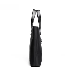 Slim side view of black nylon business briefcase with leather handles and metal zipper