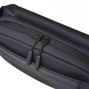 Close-up of waterproof matte fabric and durable dual zipper detail on the black tactical bag