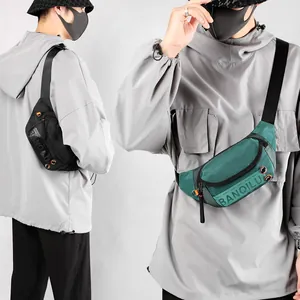 Men's sports waist bag in black and green colors featuring adjustable strap and logo