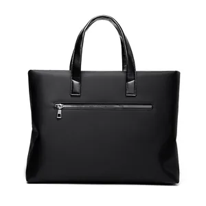 Men's black business briefcase with dual handles and front zipper pocket in matte finish