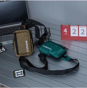 Close-up of compact rectangular crossbody phone bags in brown and forest green nylon