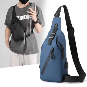 Waterproof men's sling bag with USB charging port in black and blue outdoor styles