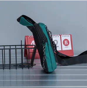 Detail view of the layered structure and breathable mesh material on the crossbody phone bag
