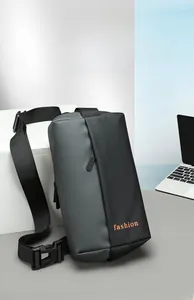 Detail of the high-quality buckle and strap on this men's trendy patchwork chest bag