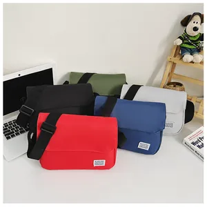 Detailed view of casual crossbody bags in five colors with adjustable nylon shoulder straps