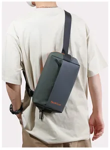 Detail of multi-color men's chest bag featuring orange fashion print and adjustable strap