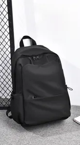 Detail view of the waterproof black backpack featuring multiple hidden zipper pockets