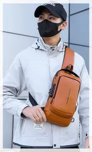 Brown leather chest bag for men featuring anti-theft combination lock and side handle