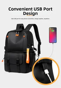 Detail of travel backpack showing built-in USB charging port with connected phone