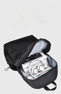 Detail view of large capacity backpack interior showing laptop and accessory compartments