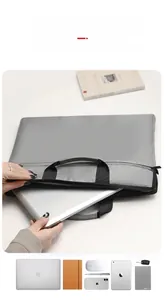 Detail view of 14-inch laptop sleeve with storage for mouse, phone and accessories