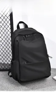 Detailed scene display of a black business backpack featuring spacious compartments and side pockets
