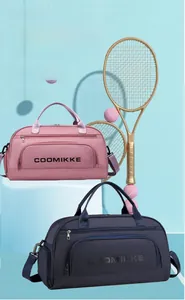 Detail view of the pink and blue travel bag with waterproof nylon and exterior pocket