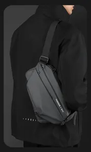 Detailed side view of black functional crossbody bag with adjustable strap and techwear style