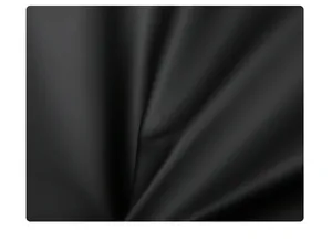 Détail de la texture du tissu noir imperméable haute densité pour sac bandoulière homme