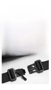 Detail of matte black magnetic quick-release buckle with nylon strap for chest bag
