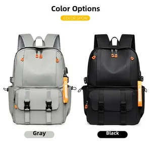 Gray and black backpacks with orange zippers and buckle closures in color selection view
