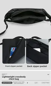 Detail view of large main compartment and anti-theft back pocket on black crossbody bag