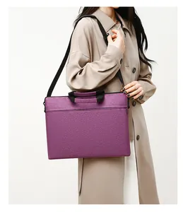 Woman carrying a purple waterproof oxford laptop bag with handle and shoulder strap