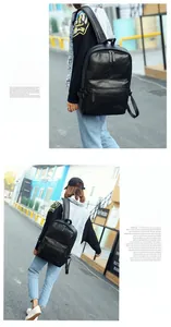Detailed close-up of a premium black PU leather backpack with sleek urban design