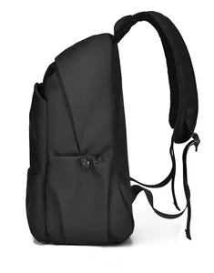 Side view of black minimalist backpack showing drawstring side pocket and durable fabric